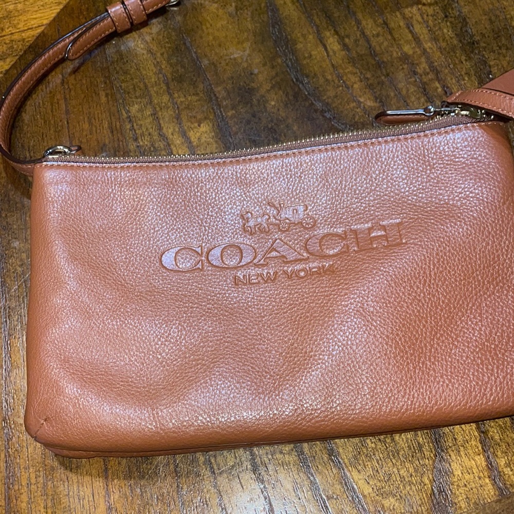 Coach woman’s tan crossbody gently used